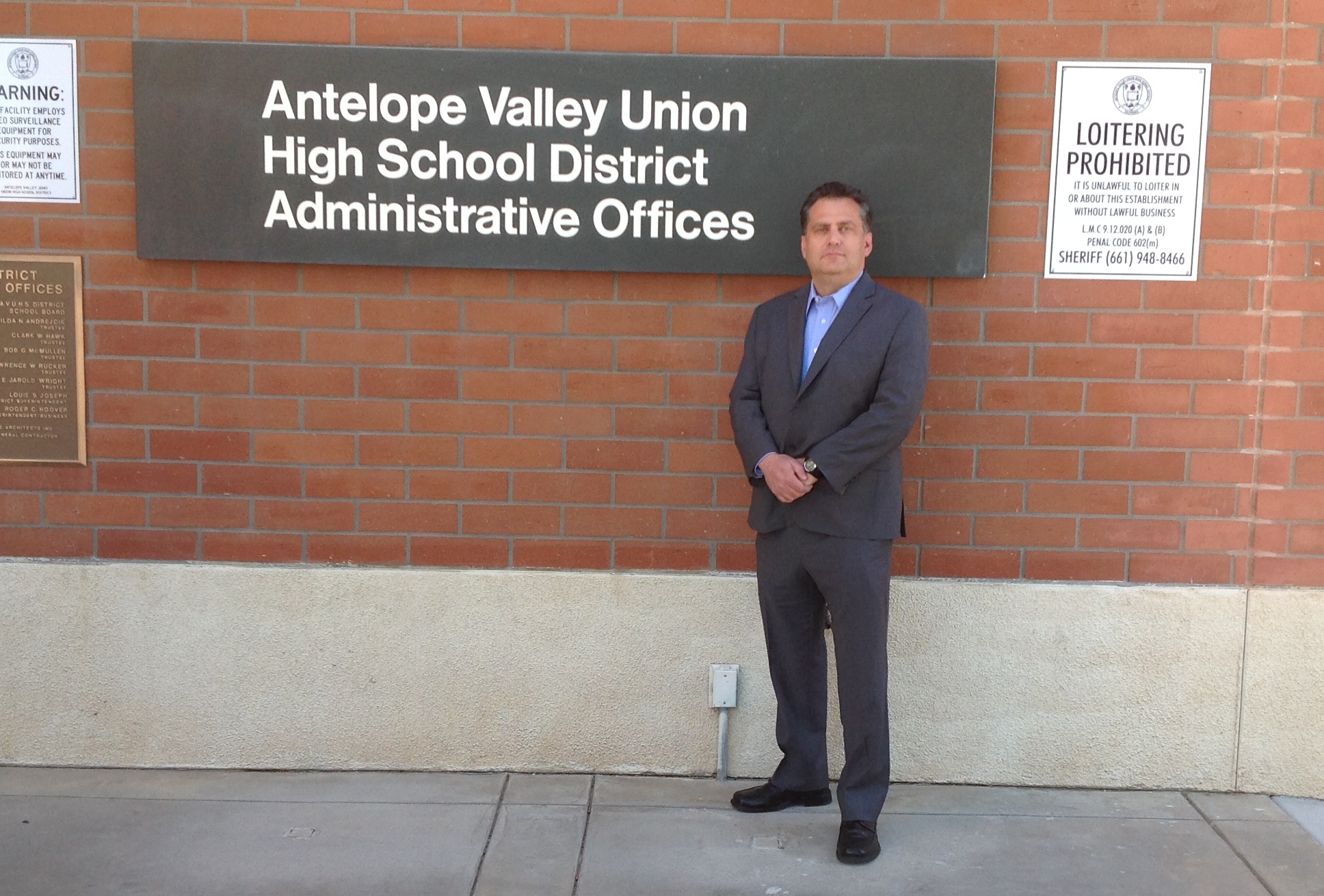 Plaintiff David Dionne stands in front of the offices of the Antelope Valley Union High School District, which censored scholarships from Dionne's group and FFRF.