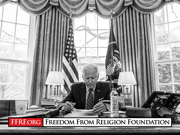 President Biden at desk in White House