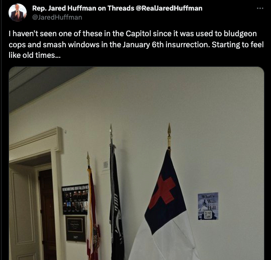 A post on social media about a representative having a christian nationalist flag