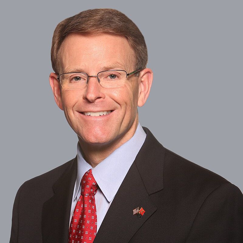 headshot of Tony Perkins in a suit