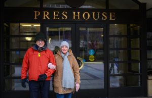 Annie Laurie Gaylor and Dan Barker in front of the Pres House for tax exemption lawsuit